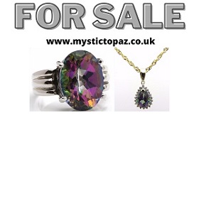 mystic topaz pendant and ring with button link to page offering domain for sale